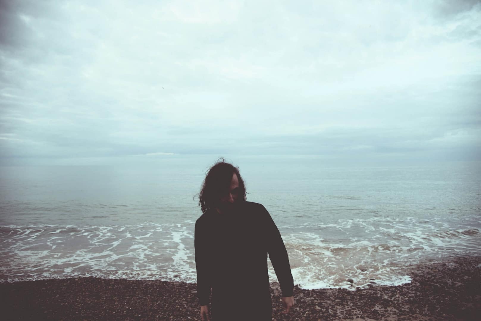 Giancarlo Erra on the beach background